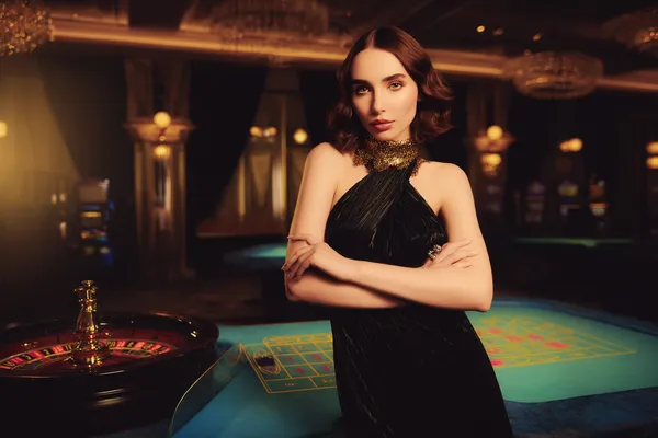 TTTJILI Jackpot Slots — Spin for massive rewards A dramatic shot of winning sevens landing on a slot reel surrounded by shining gold coins, symbolizing big wins.